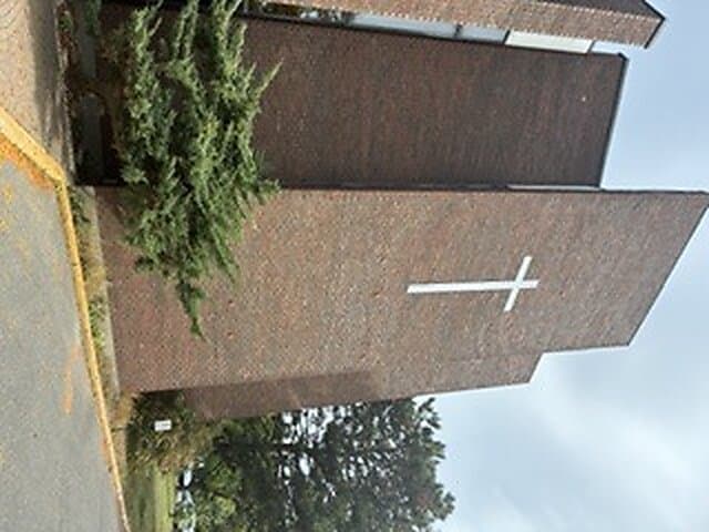 Blessing of the new cross outside Église Sainte-Angèle