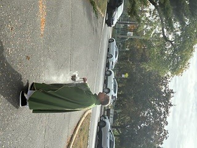 Blessing of the new cross outside Église Sainte-Angèle