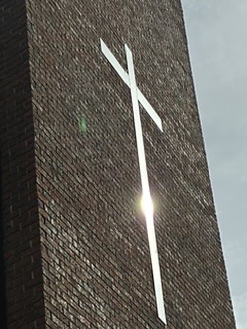 Blessing of the new cross outside Église Sainte-Angèle