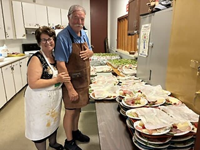 Volunteers preparing food for the spaghetti dinner