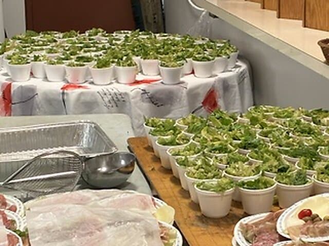 Volunteers preparing food for the spaghetti dinner